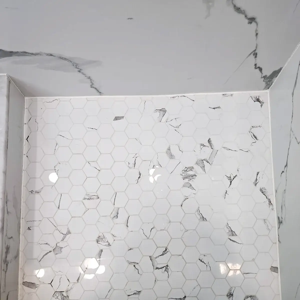 Shower tile and tub corner resealed with clean white silicone – North Jersey bathroom repair